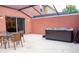 Patio with hot tub, table, and chairs at 3006 Red Ginger Rd, Kissimmee, FL 34747