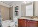 Bathroom with granite countertop and bathtub at 200 Pendant Ct, Kissimmee, FL 34747