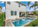 Inviting pool and spa with patio furniture, perfect for relaxation at 200 Pendant Ct, Kissimmee, FL 34747