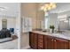 Double vanity bathroom with granite countertop at 200 Pendant Ct, Kissimmee, FL 34747