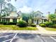 Community clubhouse with landscaping at 2022 Royal Bay Blvd # 93, Kissimmee, FL 34746