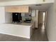 Kitchen with breakfast bar, stainless steel appliances, and tile floor at 2022 Royal Bay Blvd # 93, Kissimmee, FL 34746