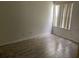 Bright bedroom with tile flooring and window at 2022 Royal Bay Blvd # 93, Kissimmee, FL 34746