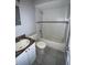 Clean bathroom with tub shower and granite vanity at 9817 Turf Way # 8, Orlando, FL 32837
