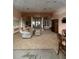 Elegant community clubhouse interior with comfortable seating and high ceilings at 9817 Turf Way # 8, Orlando, FL 32837