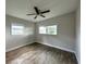 Spacious bedroom with tile floors and ceiling fan at 1413 45Th St, Orlando, FL 32839