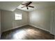 Well-lit bedroom with ceiling fan and wood-look floors at 1413 45Th St, Orlando, FL 32839