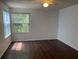 Spacious bedroom with hardwood floors and ample natural light at 2717 N Poinciana Blvd # 179, Kissimmee, FL 34746