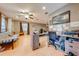 Living room with hardwood floors and workspace at 4401 Mesa Verde Dr, Saint Cloud, FL 34769