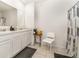 Clean bathroom with double vanity and shower at 6728 Huntleigh Hammock Rd, Harmony, FL 34773
