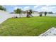 Backyard with grassy area, playset, and playground equipment at 6728 Huntleigh Hammock Rd, Harmony, FL 34773