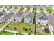 Aerial view of homes with solar panels and backyards at 6728 Huntleigh Hammock Rd, Harmony, FL 34773