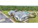 Community clubhouse and pool with surrounding landscaping at 6728 Huntleigh Hammock Rd, Harmony, FL 34773