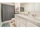 Bathroom with double vanity and shower/tub combo at 6728 Huntleigh Hammock Rd, Harmony, FL 34773