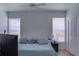 Primary bedroom with a large bed and ample closet space at 1100 Lake Shadow Cir # 2101, Maitland, FL 32751