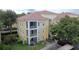 Three-story building with balconies and ample parking at 1100 Lake Shadow Cir # 2101, Maitland, FL 32751