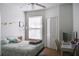 Bright bedroom with a queen bed, workspace, and ample closet space at 1100 Lake Shadow Cir # 2101, Maitland, FL 32751