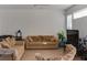Relaxing living room with sectional sofa and large TV at 1100 Lake Shadow Cir # 2101, Maitland, FL 32751