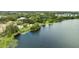Community lakeside view with lush greenery at 1100 Lake Shadow Cir # 2101, Maitland, FL 32751