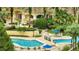 Elevated view of resort-style pool and patio area at 1100 Lake Shadow Cir # 2101, Maitland, FL 32751