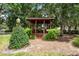 Community gazebo nestled in a lush green space at 1105 Monroe Ave., St Cloud, FL 34769