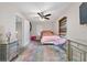 Bedroom with carpeted floors and large windows at 1105 Monroe Ave., St Cloud, FL 34769