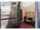 Enclosed front patio with seating and brick exterior at 1105 Monroe Ave., St Cloud, FL 34769