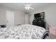 Bright bedroom with ceiling fan and built-in dresser at 1105 Monroe Ave., St Cloud, FL 34769