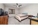 Bedroom with double bed, dresser, and a view of the backyard at 1105 Monroe Ave., St Cloud, FL 34769