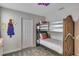 bedroom with a bunk bed and Frozen-themed decor at 4514 Narrative Ln, Kissimmee, FL 34746