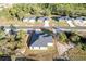 New home nestled in a quiet neighborhood, surrounded by trees at 1306 Congo Dr, Poinciana, FL 34759