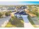 New construction home with driveway and grassy yard at 1306 Congo Dr, Poinciana, FL 34759