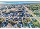 Community overview featuring multiple houses near a lake at 1306 Congo Dr, Poinciana, FL 34759