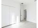 Bright bedroom with double doors leading to a spacious closet at 1306 Congo Dr, Poinciana, FL 34759