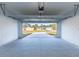 Garage with view of the neighborhood at 1306 Congo Dr, Poinciana, FL 34759