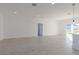 Bright and airy living room featuring light wood flooring and sliding glass doors at 1306 Congo Dr, Poinciana, FL 34759