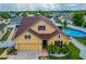 Attractive two-story house with a circular pool at 3044 Cameron Dr, Kissimmee, FL 34743