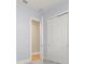 Bedroom with light gray walls and carpet at 15424 Enchanted Melody Way, Winter Garden, FL 34787