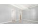 Spacious bedroom with plush carpeting and an ensuite bathroom at 15424 Enchanted Melody Way, Winter Garden, FL 34787