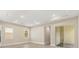 Bright living room featuring hardwood floors and recessed lighting at 15424 Enchanted Melody Way, Winter Garden, FL 34787