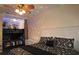 Large bedroom with King bed, a bunk bed, and fun lighting features at 7671 Comrow St # 302, Kissimmee, FL 34747