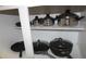 Organized kitchen cabinets with various pots and pans at 7671 Comrow St # 302, Kissimmee, FL 34747