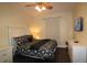 King bedroom with TV and modern decor at 7671 Comrow St # 302, Kissimmee, FL 34747