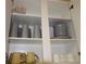 Well-stocked kitchen cabinets with dishes and cookware at 7671 Comrow St # 302, Kissimmee, FL 34747