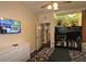 Bedroom with King bed, TV, and adjacent bunk bed area at 7671 Comrow St # 302, Kissimmee, FL 34747