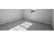 Spacious bedroom with carpeted floors and large window at 2035 Stetson Ct, Eagle Lake, FL 33839