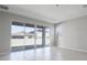 Living area with sliding glass doors leading to a backyard patio at 2035 Stetson Ct, Eagle Lake, FL 33839