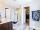 Bathroom with walk-in shower and access to the closet at 592 Lake Smart Blvd, Winter Haven, FL 33881
