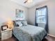 Bedroom with a double bed, nightstand, and window at 592 Lake Smart Blvd, Winter Haven, FL 33881