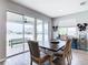 Casual dining area with sliding glass doors leading to patio at 592 Lake Smart Blvd, Winter Haven, FL 33881